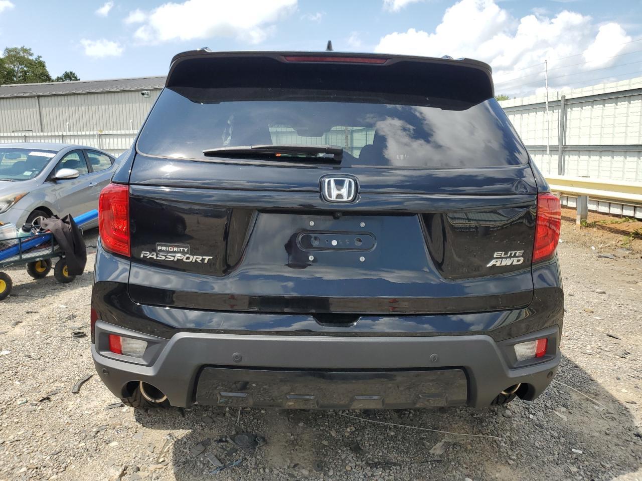 2022 Honda Passport Elite VIN: 5FNYF8H06NB019195 Lot: 64836185