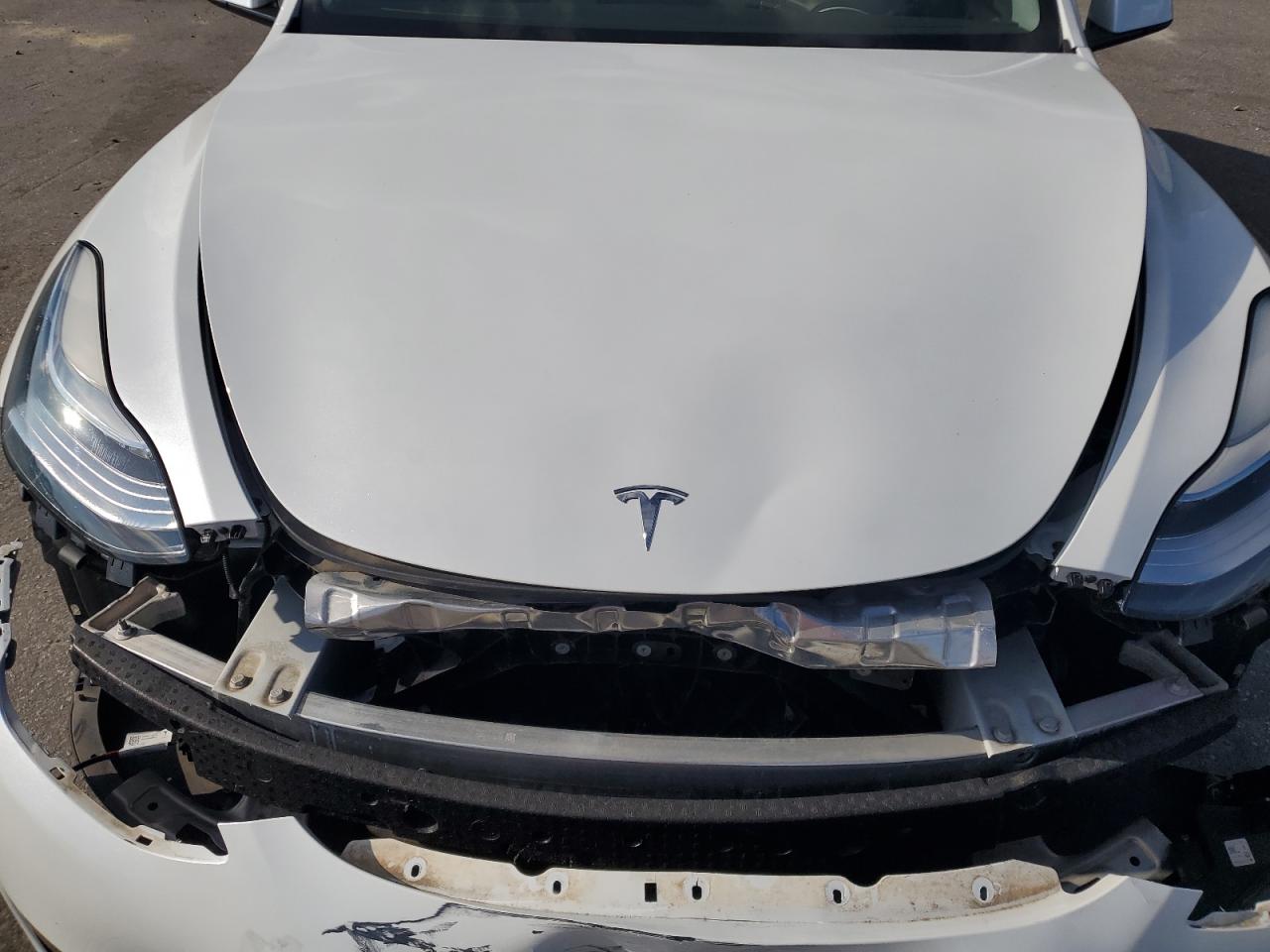 2023 Tesla Model Y VIN: 7SAYGDEE2PA039968 Lot: 60979735