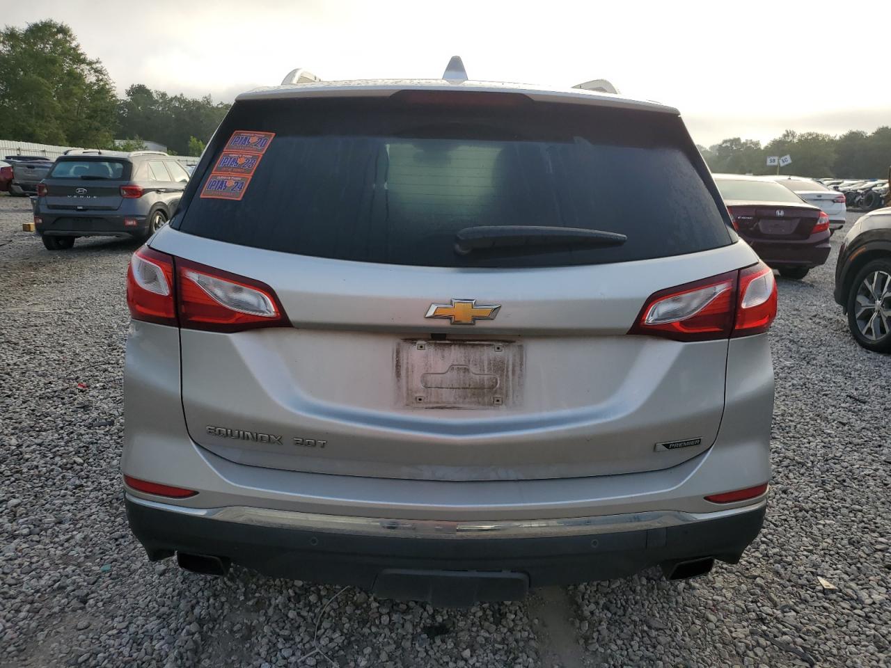 2018 Chevrolet Equinox Premier VIN: 2GNAXNEX6J6242780 Lot: 65119565