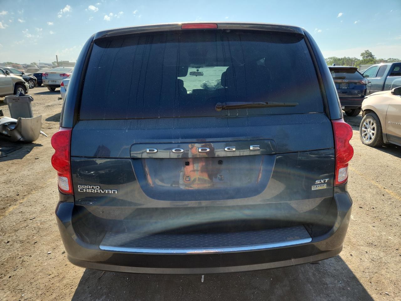 2014 Dodge Grand Caravan Sxt VIN: 2C4RDGCG3ER244770 Lot: 61854205