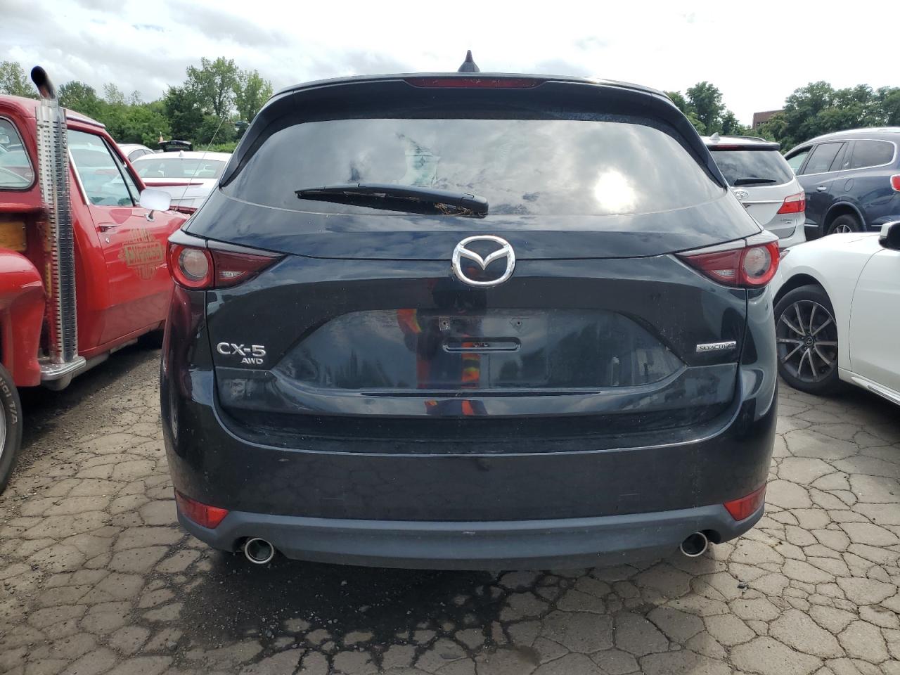 2021 Mazda Cx-5 Touring VIN: JM3KFBCM1M1386565 Lot: 61940315
