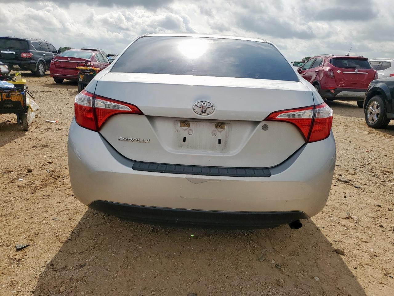 2016 Toyota Corolla L VIN: 5YFBURHE1GP385621 Lot: 64494375