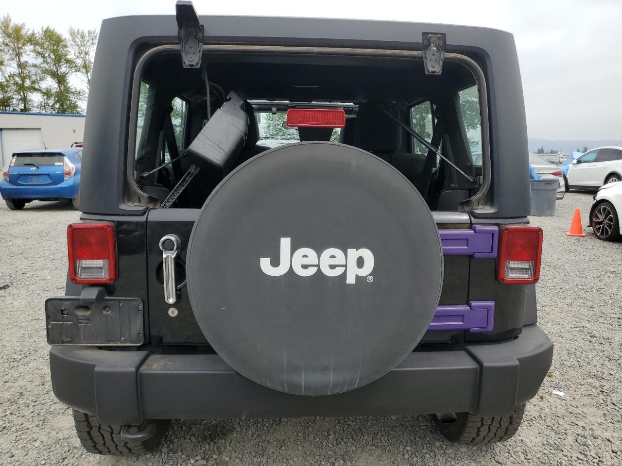 2012 Jeep Wrangler Unlimited Sport VIN: 1C4BJWDG5CL120301 Lot: 65282375