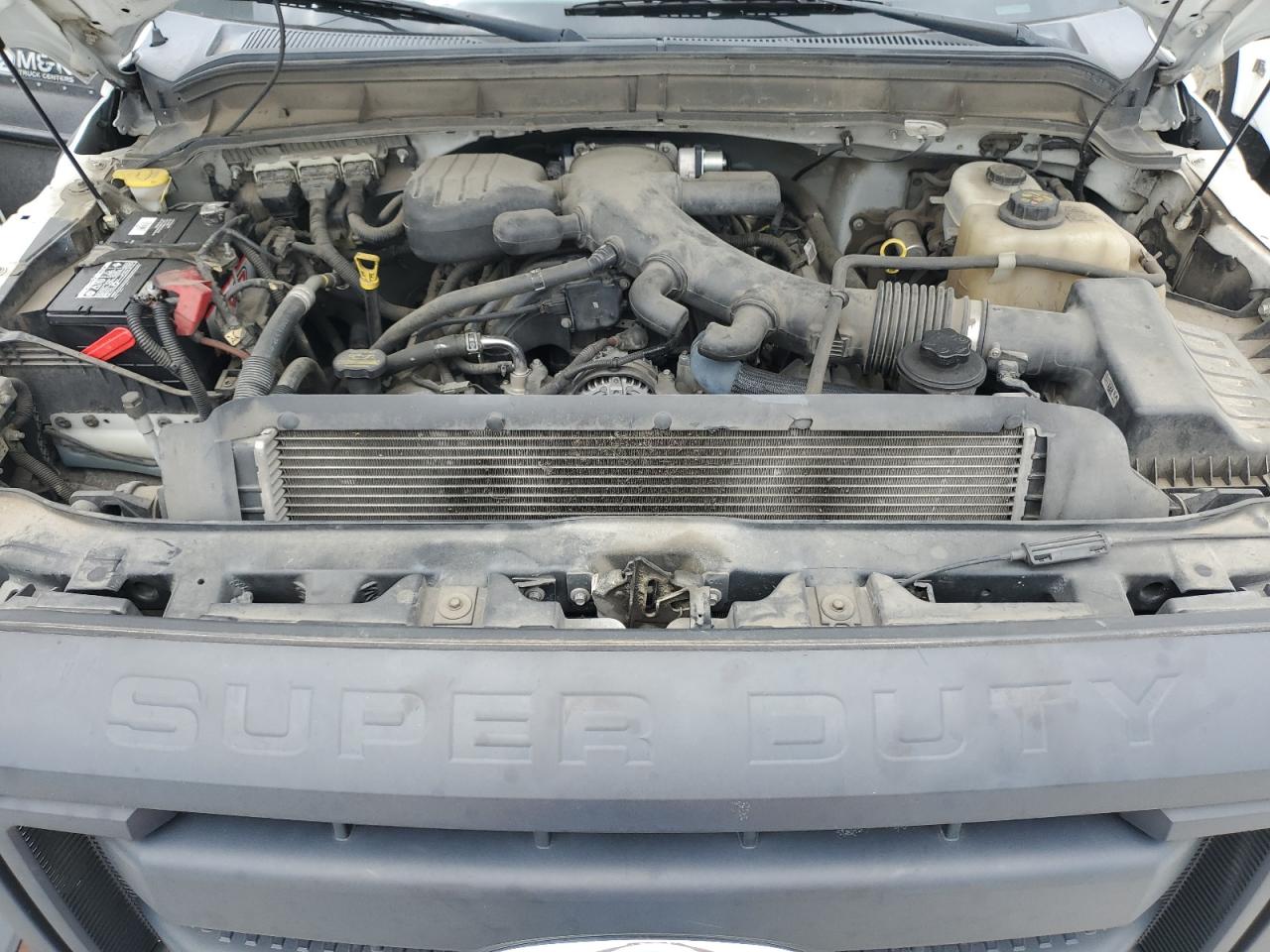 2013 Ford F450 Super Duty VIN: 1FDUF4GYXDEA69804 Lot: 64409735