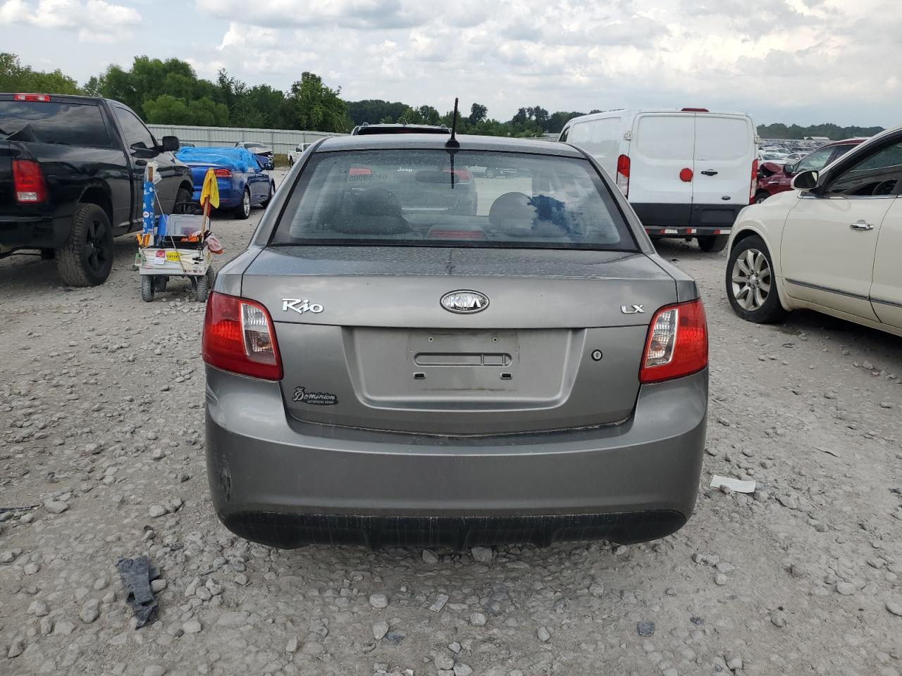 2011 Kia Rio Base VIN: KNADH4A32B6869934 Lot: 64559905