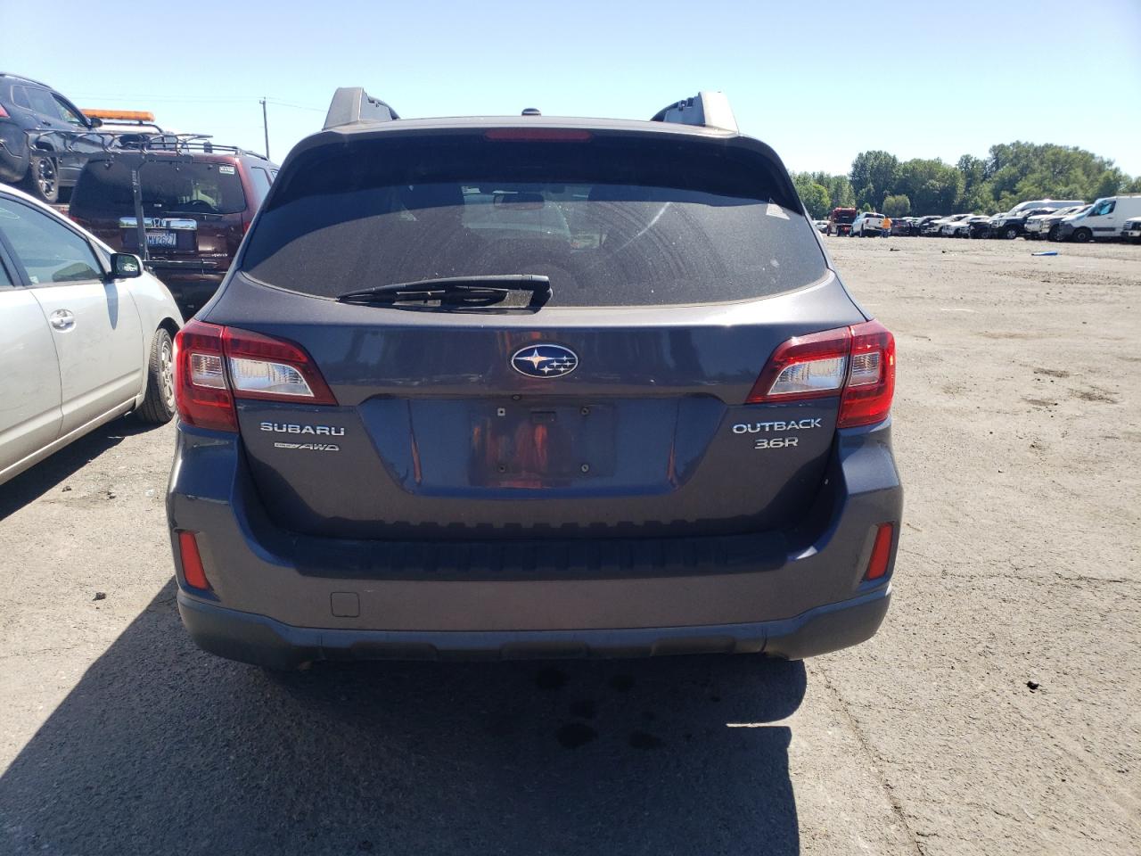 2015 Subaru Outback 3.6R Limited VIN: 4S4BSENC1F3243192 Lot: 64690675