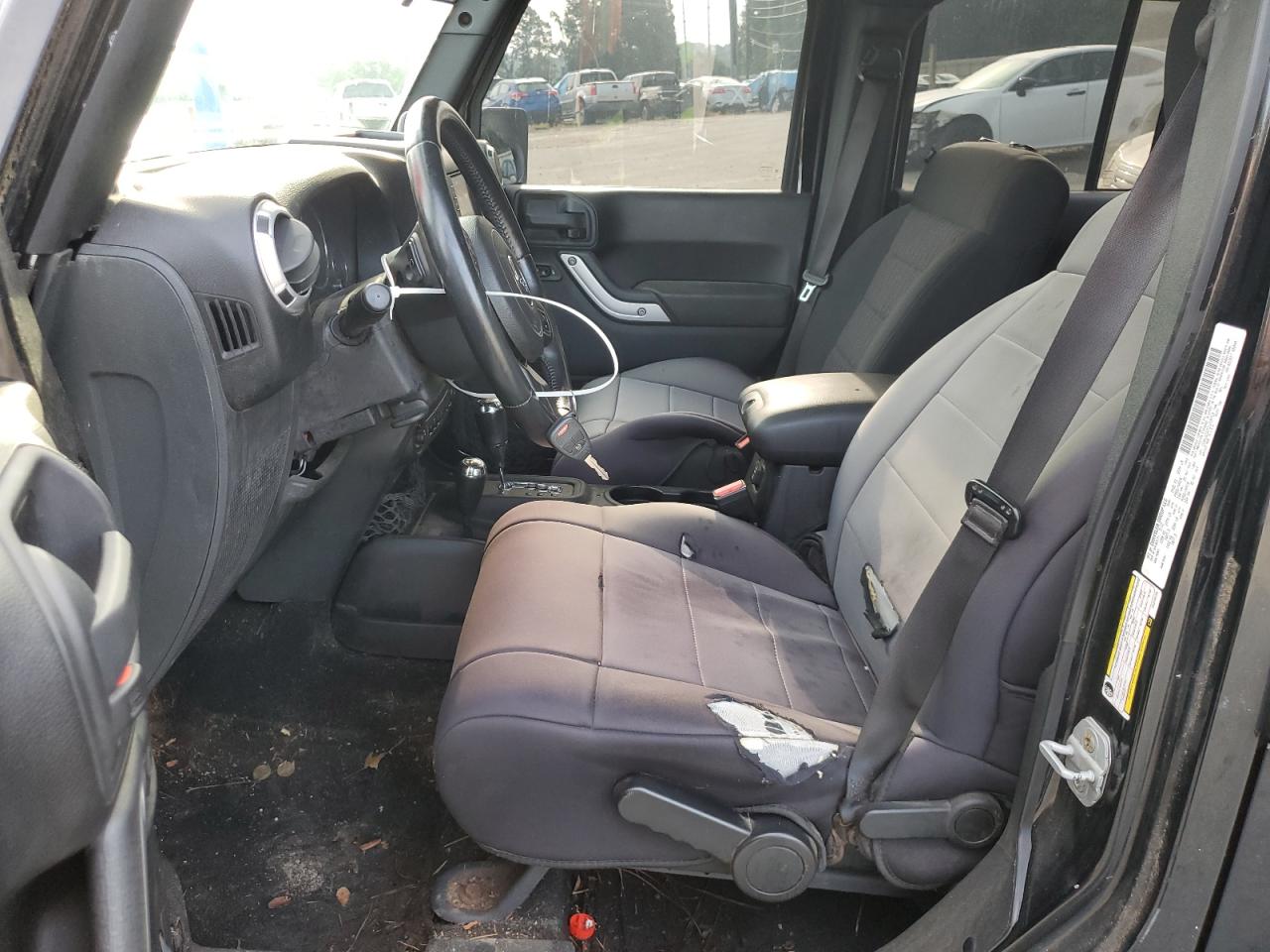 2012 Jeep Wrangler Unlimited Sahara VIN: 1C4HJWEG7CL219713 Lot: 66751325