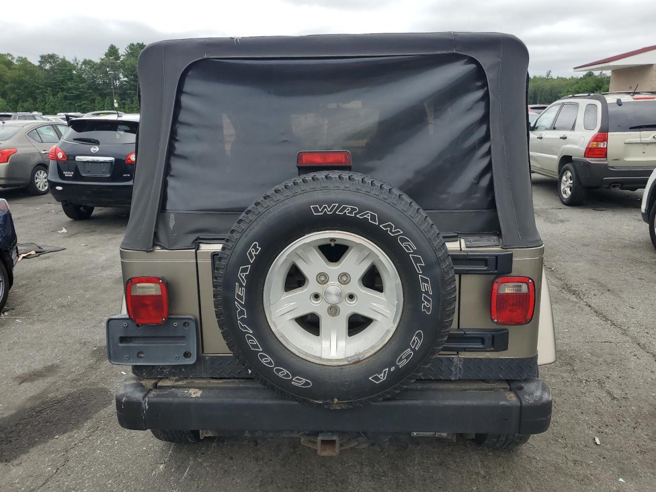 2004 Jeep Wrangler / Tj Sahara VIN: 1J4FA59S84P801582 Lot: 64183535