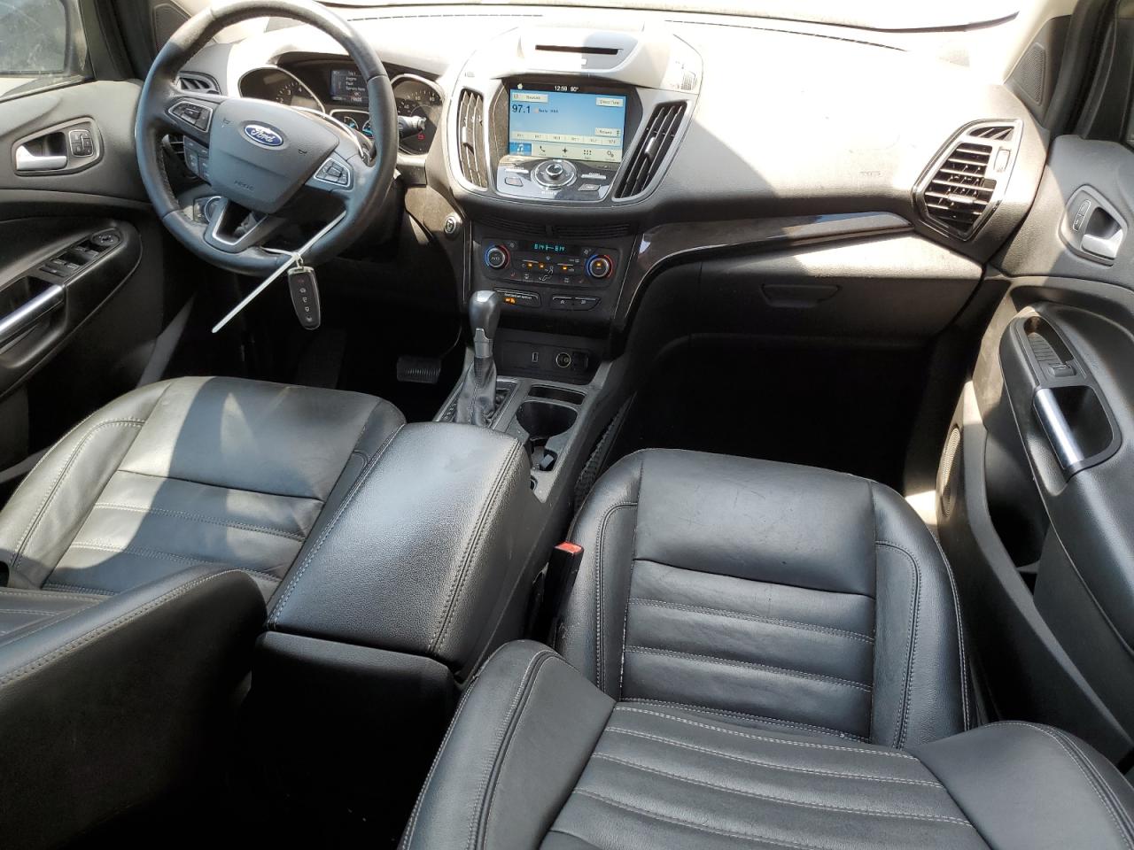 2017 Ford Escape Titanium VIN: 1FMCU0J90HUE48236 Lot: 64848105