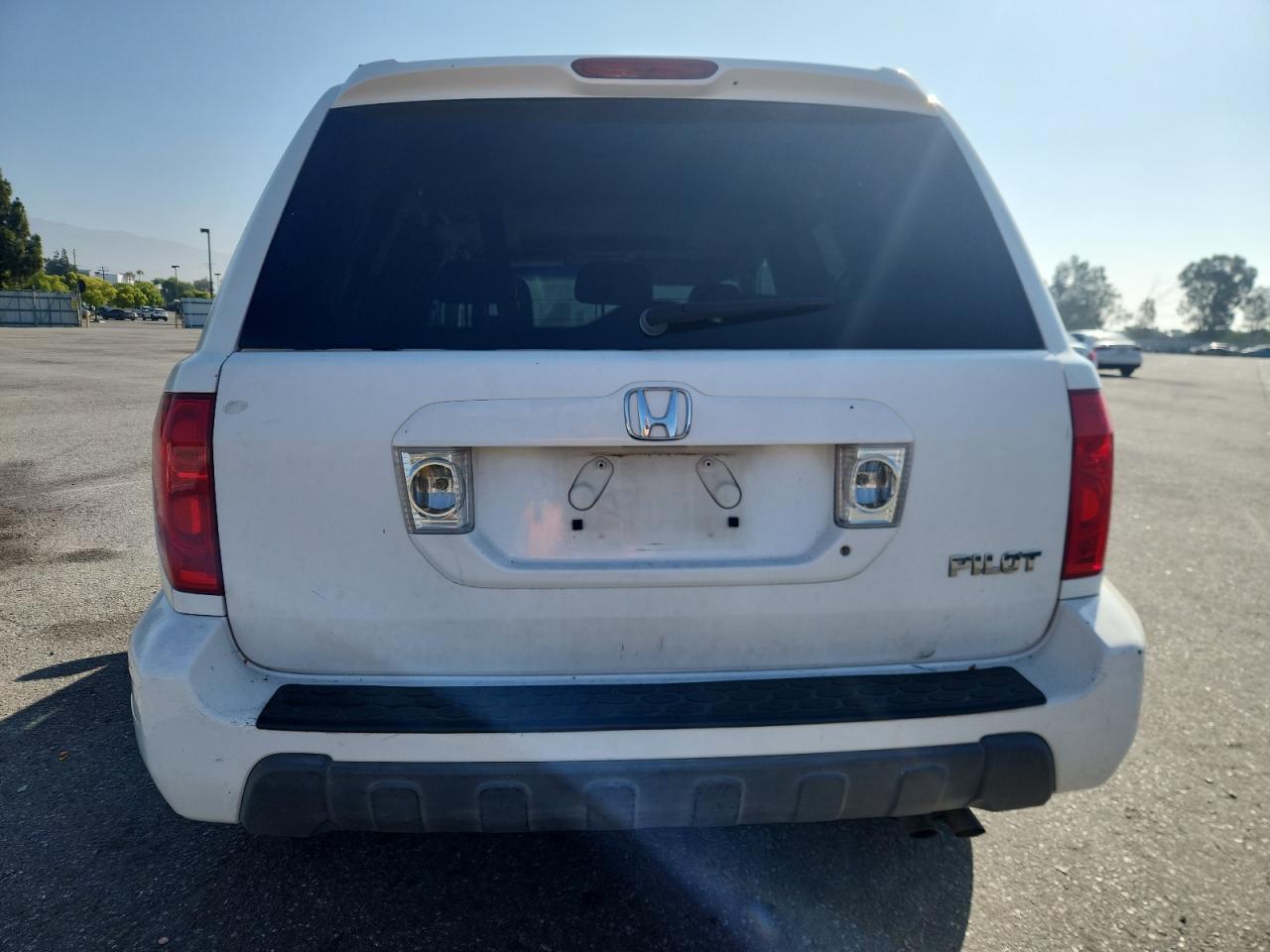 2005 Honda Pilot Exl VIN: 5FNYF18585B051911 Lot: 63694105