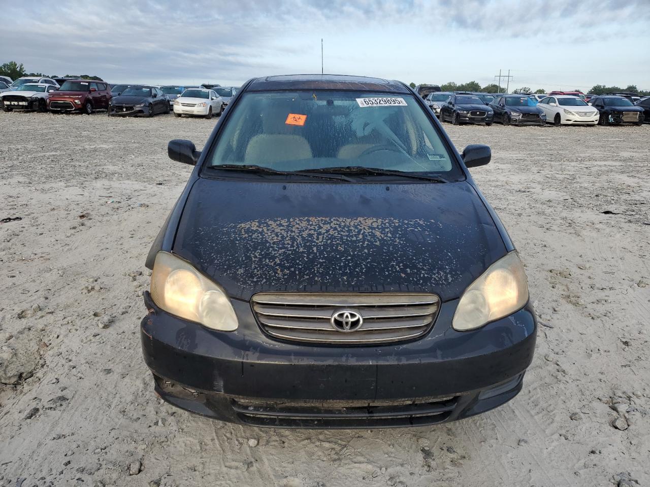 2003 Toyota Corolla Ce VIN: 2T1BR32E93C010092 Lot: 65329895