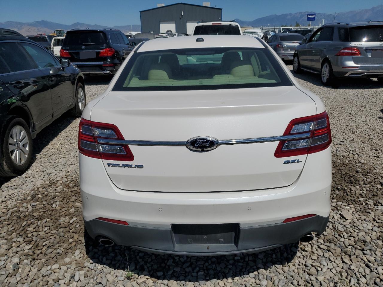 2015 Ford Taurus Sel VIN: 1FAHP2E8XFG181929 Lot: 64022325