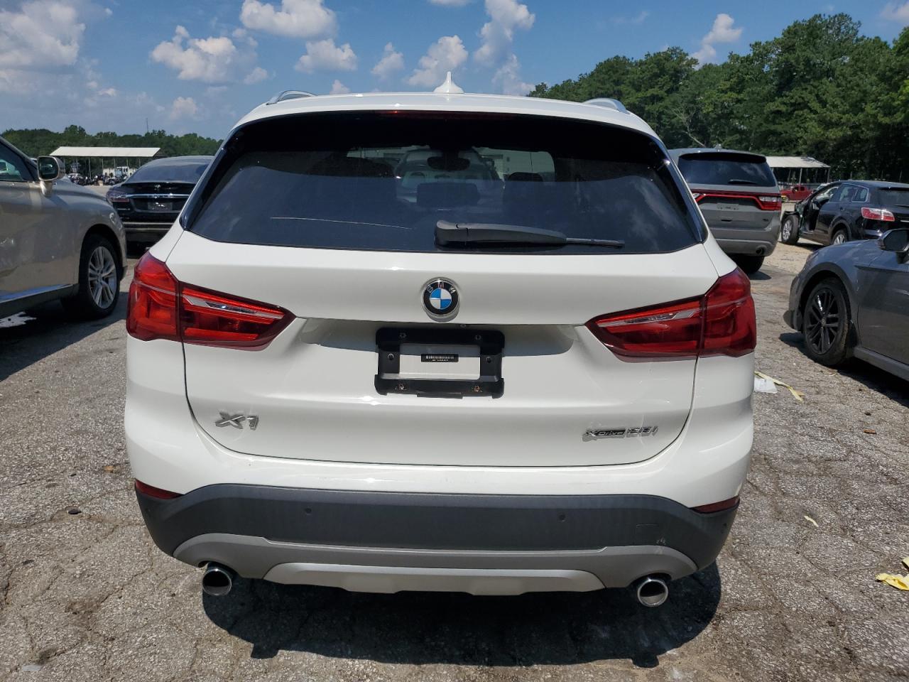 2018 BMW X1 xDrive28I VIN: WBXHT3C38J5L30199 Lot: 63634015