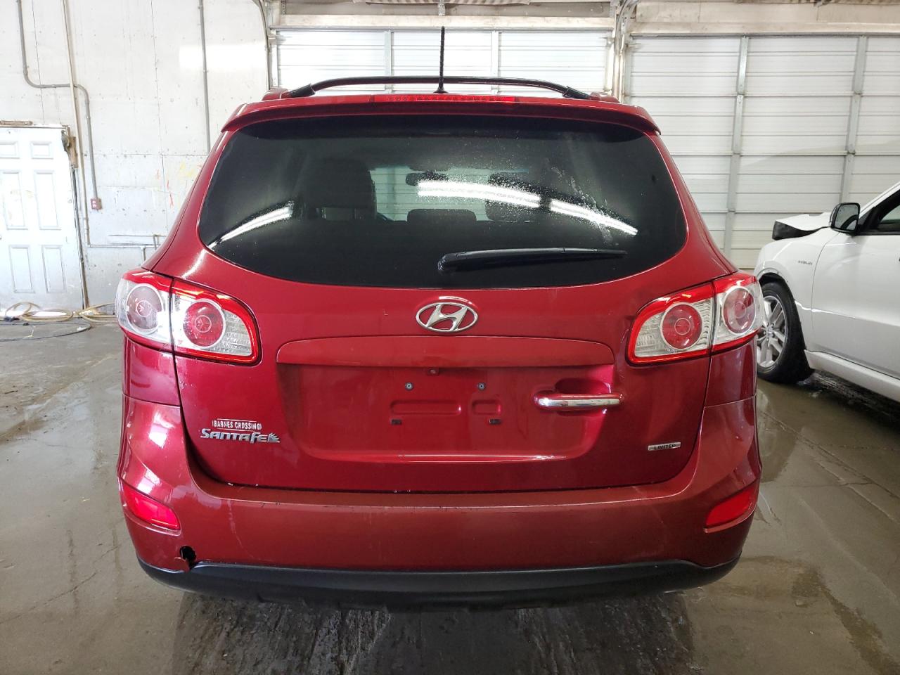 2012 Hyundai Santa Fe Limited VIN: 5XYZK4AG2CG141140 Lot: 65231845