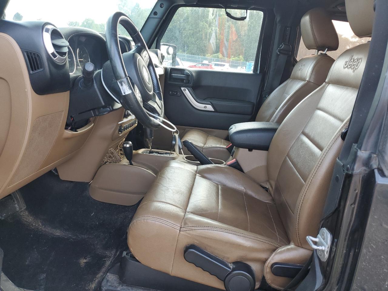 2011 Jeep Wrangler Sahara VIN: 1J4AA5D15BL552185 Lot: 63065185