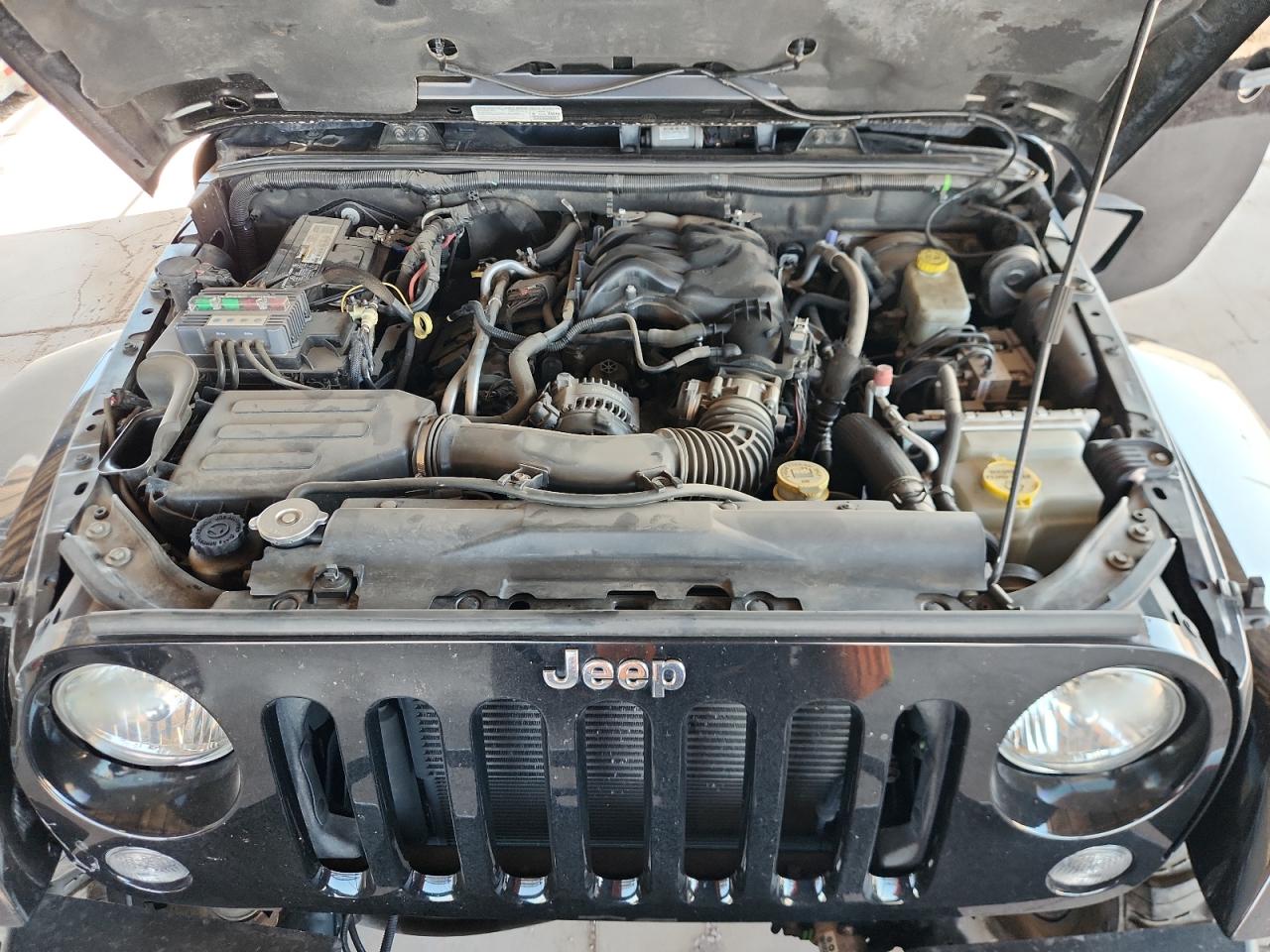 2014 Jeep Wrangler Unlimited Sahara VIN: 1C4BJWEG1EL203726 Lot: 64123135