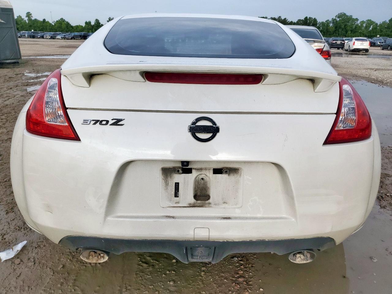 2009 Nissan 370Z VIN: JN1AZ44E19M410242 Lot: 64311145