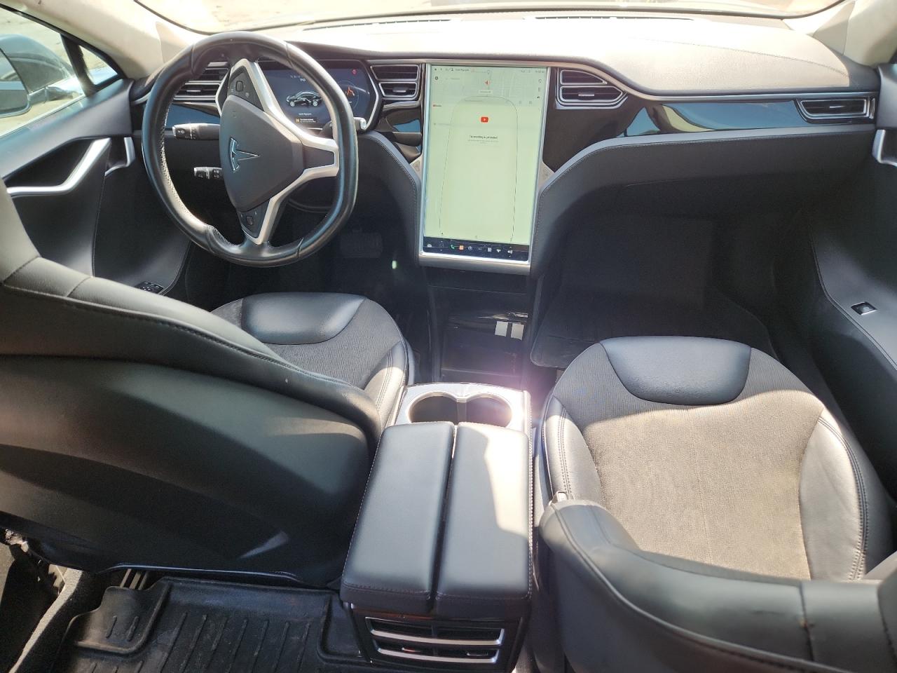 2015 Tesla Model S VIN: 5YJSA1E14FF102828 Lot: 64842295