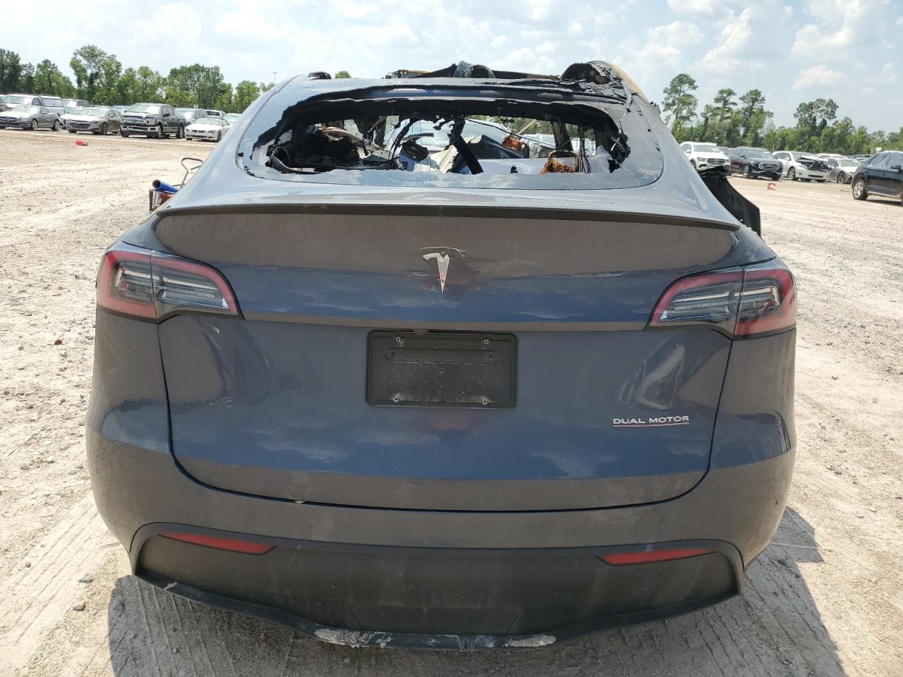 2023 Tesla Model Y VIN: 7SAYGDEF5PF829521 Lot: 65978264