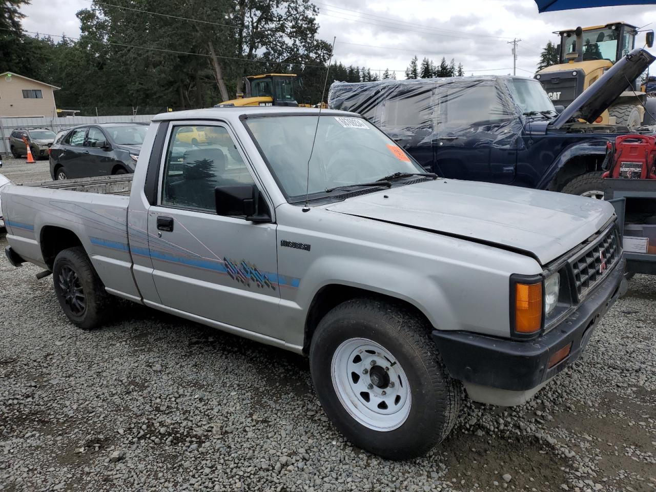 1990 Mitsubishi Mighty Max / S VIN: JA7FL24W2LP023428 Lot: 68769234