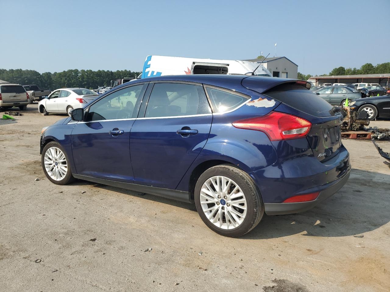 2017 Ford Focus Titanium VIN: 1FADP3N24HL212991 Lot: 67467374