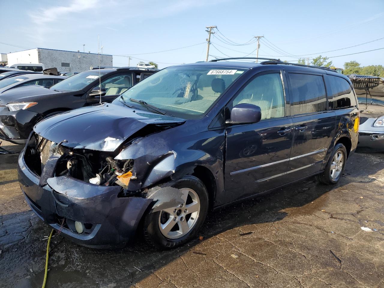 2009 Dodge Caravan - Image 1