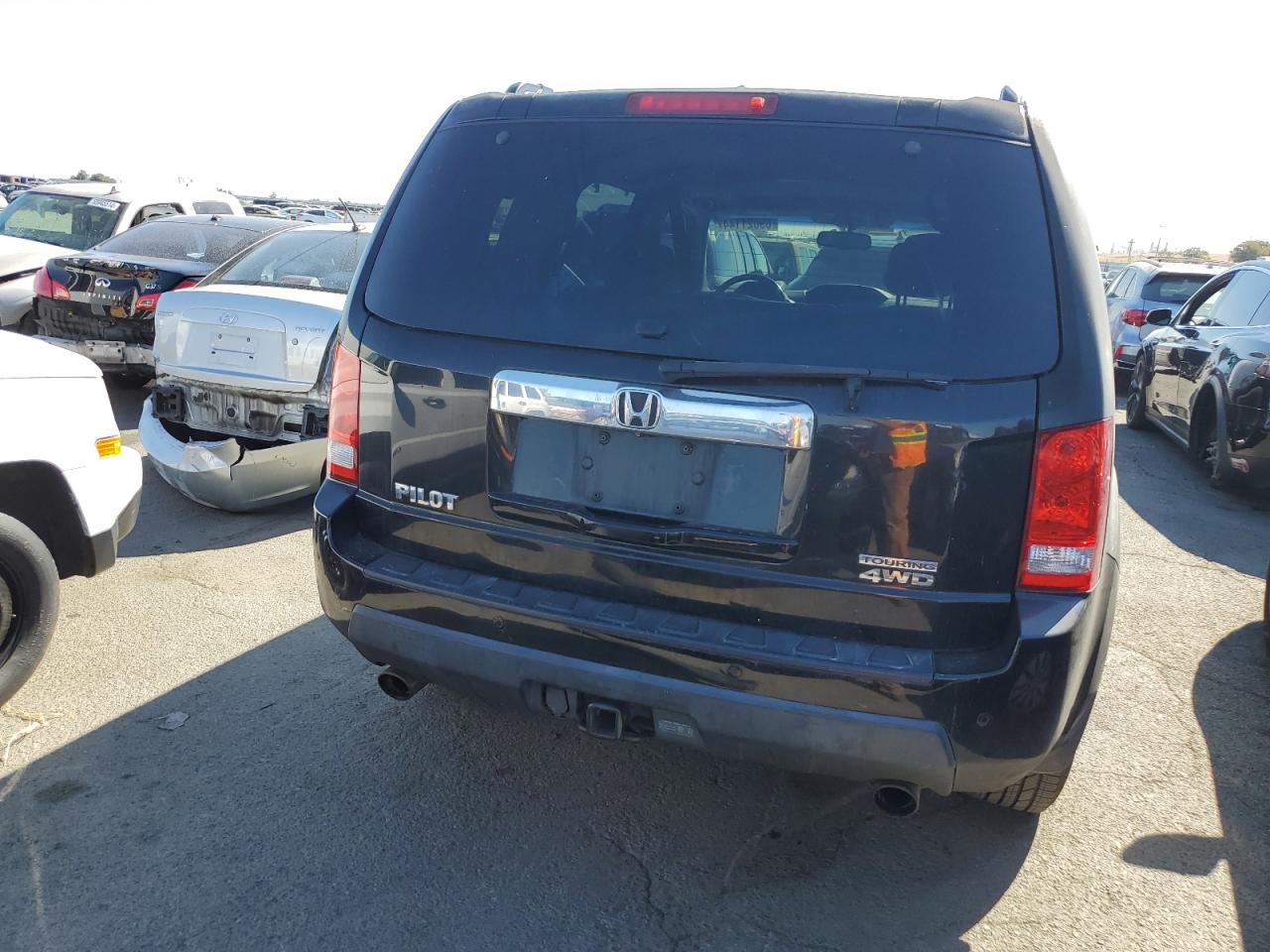 2010 Honda Pilot Touring VIN: 5FNYF4H88AB025475 Lot: 69021144