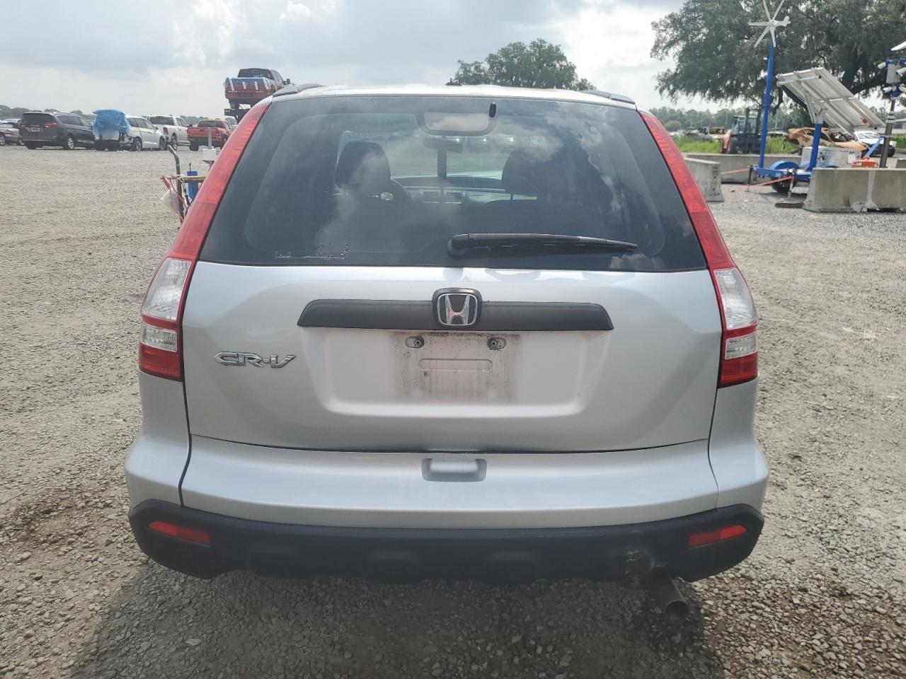 2009 Honda Cr-V Lx VIN: 3CZRE383X9G703844 Lot: 66695154