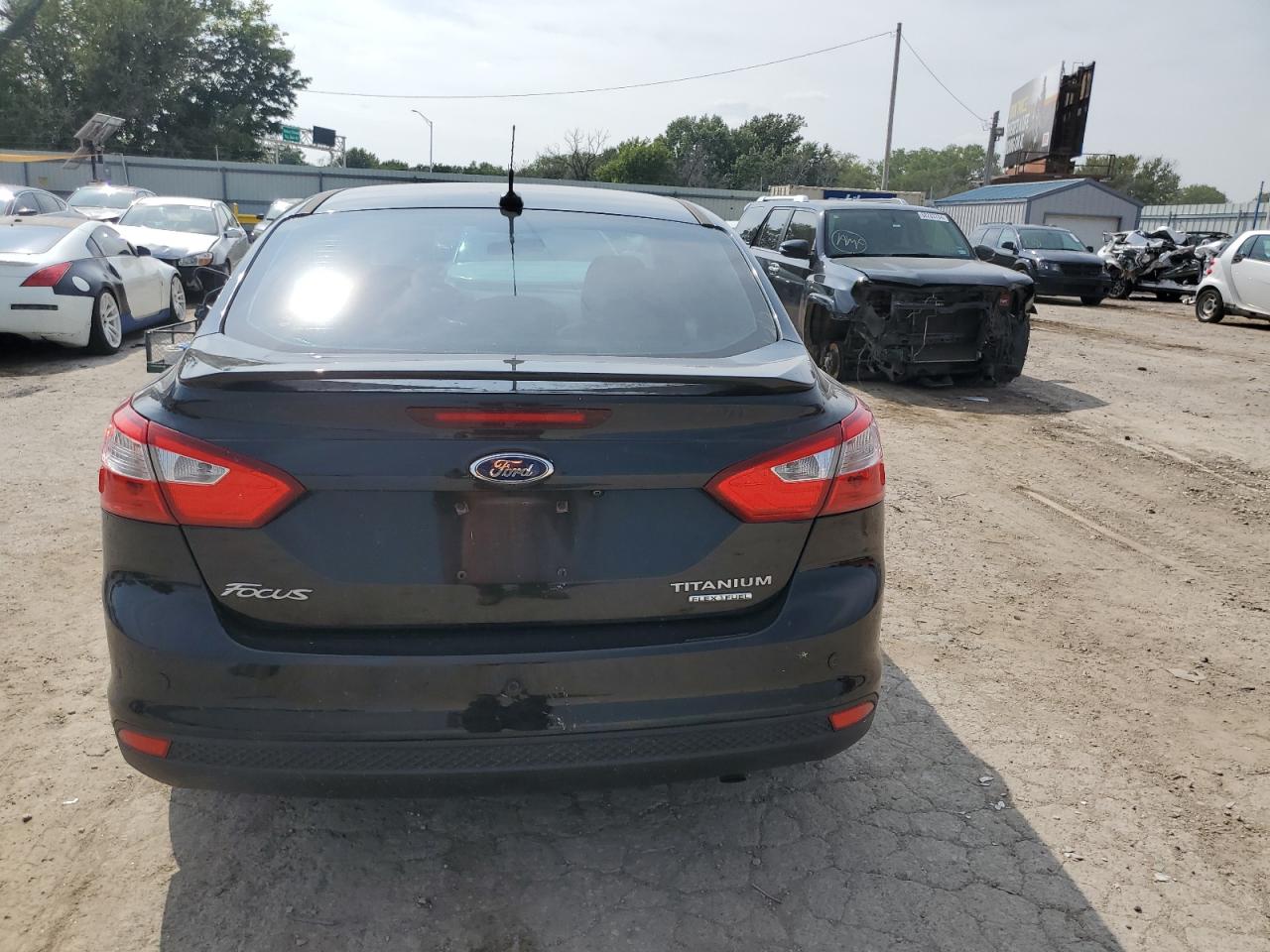 2013 Ford Focus Titanium VIN: 1FADP3J25DL234434 Lot: 68342314