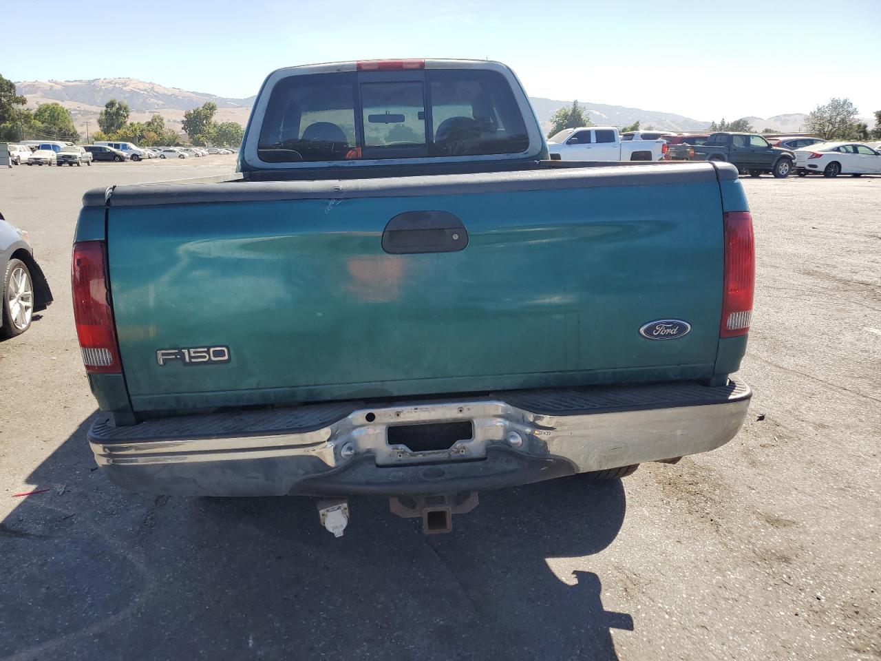 1998 Ford F150 VIN: 1FTZX18W7WKA30384 Lot: 67200064