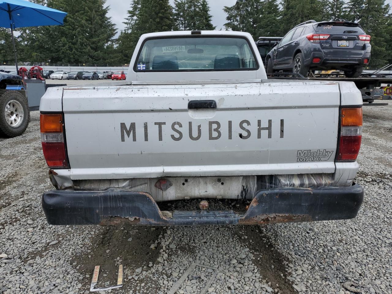 1990 Mitsubishi Mighty Max / S VIN: JA7FL24W2LP023428 Lot: 68769234