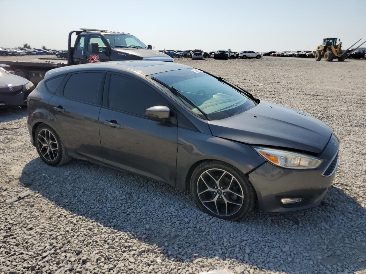 VIN 1FADP3K28FL348204 2015 FORD FOCUS no.4