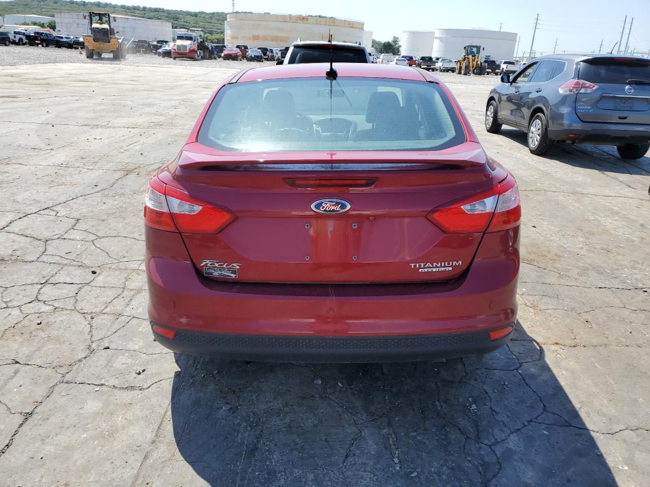 2014 Ford Focus Titanium VIN: 1FADP3J20EL460656 Lot: 67042374