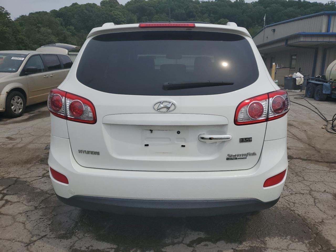 2010 Hyundai Santa Fe Limited VIN: 5NMSKDAG4AH386025 Lot: 65951204