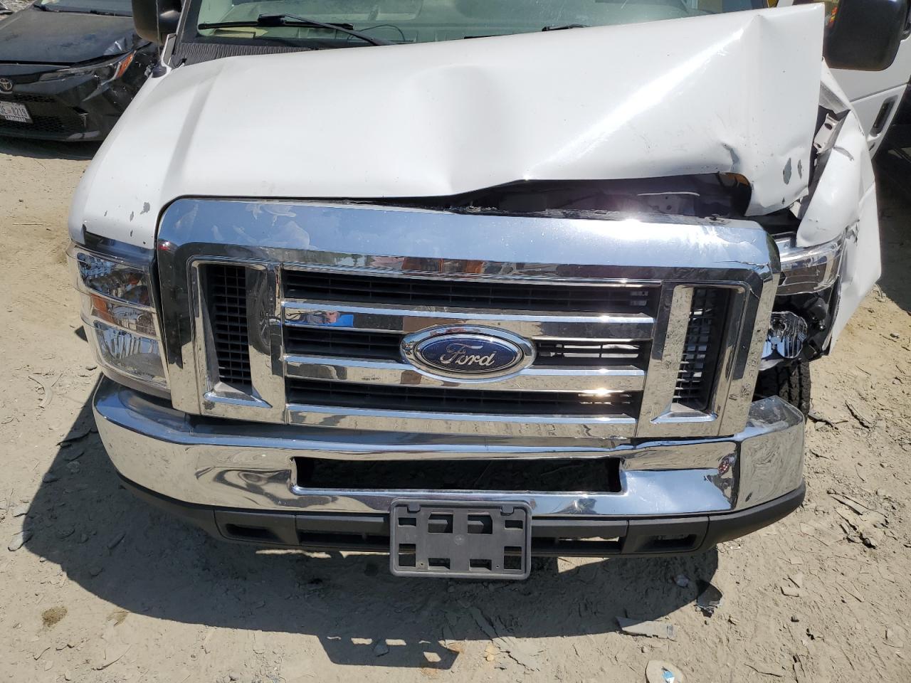 2011 Ford Econoline E350 Super Duty Wagon VIN: 1FBNE3BL0BDB07565 Lot: 65794234