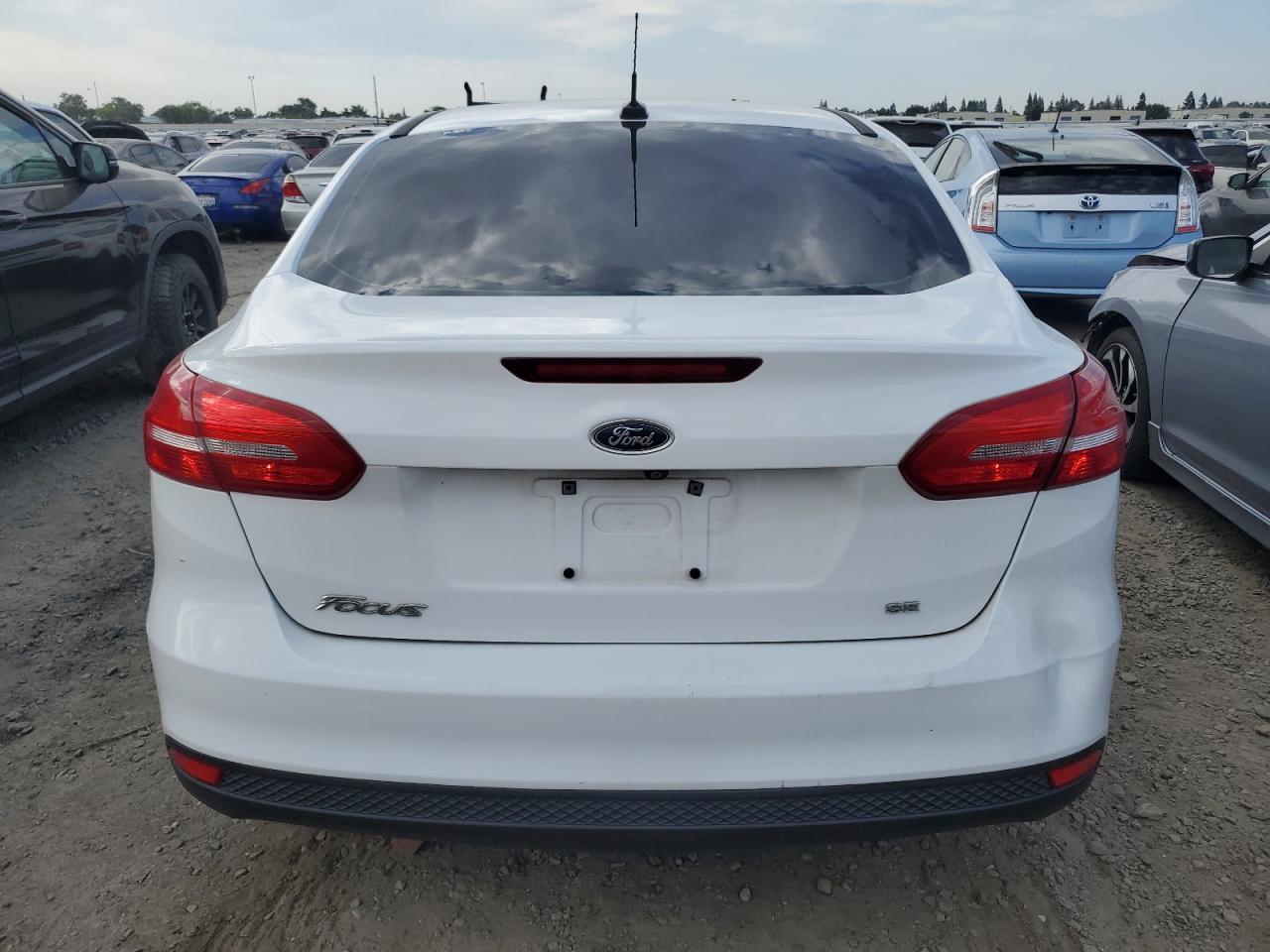 2017 Ford Focus Se VIN: 1FADP3F24HL271618 Lot: 65856814