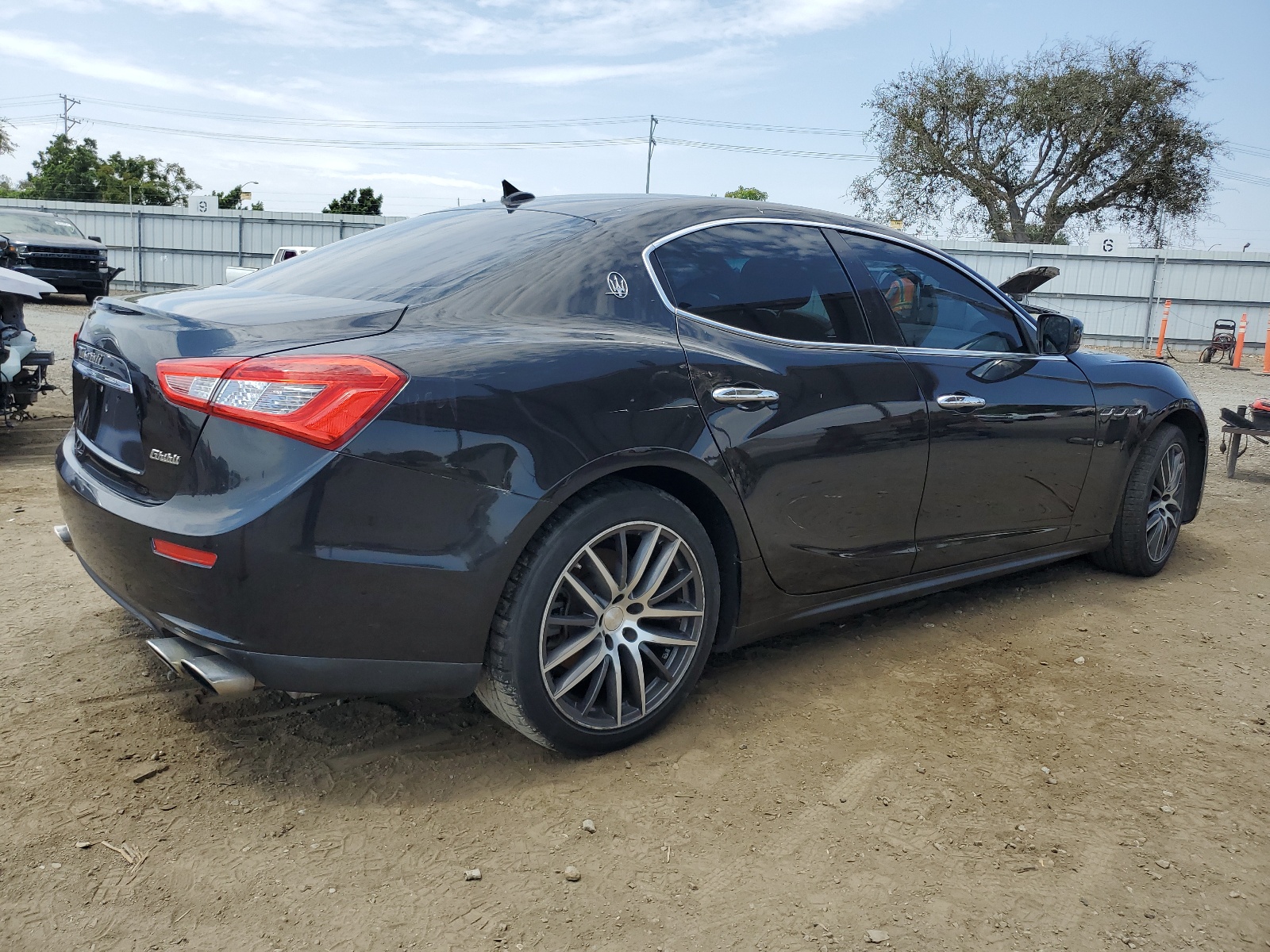 2014 Maserati Ghibli vin: ZAM57XSA5E1090243