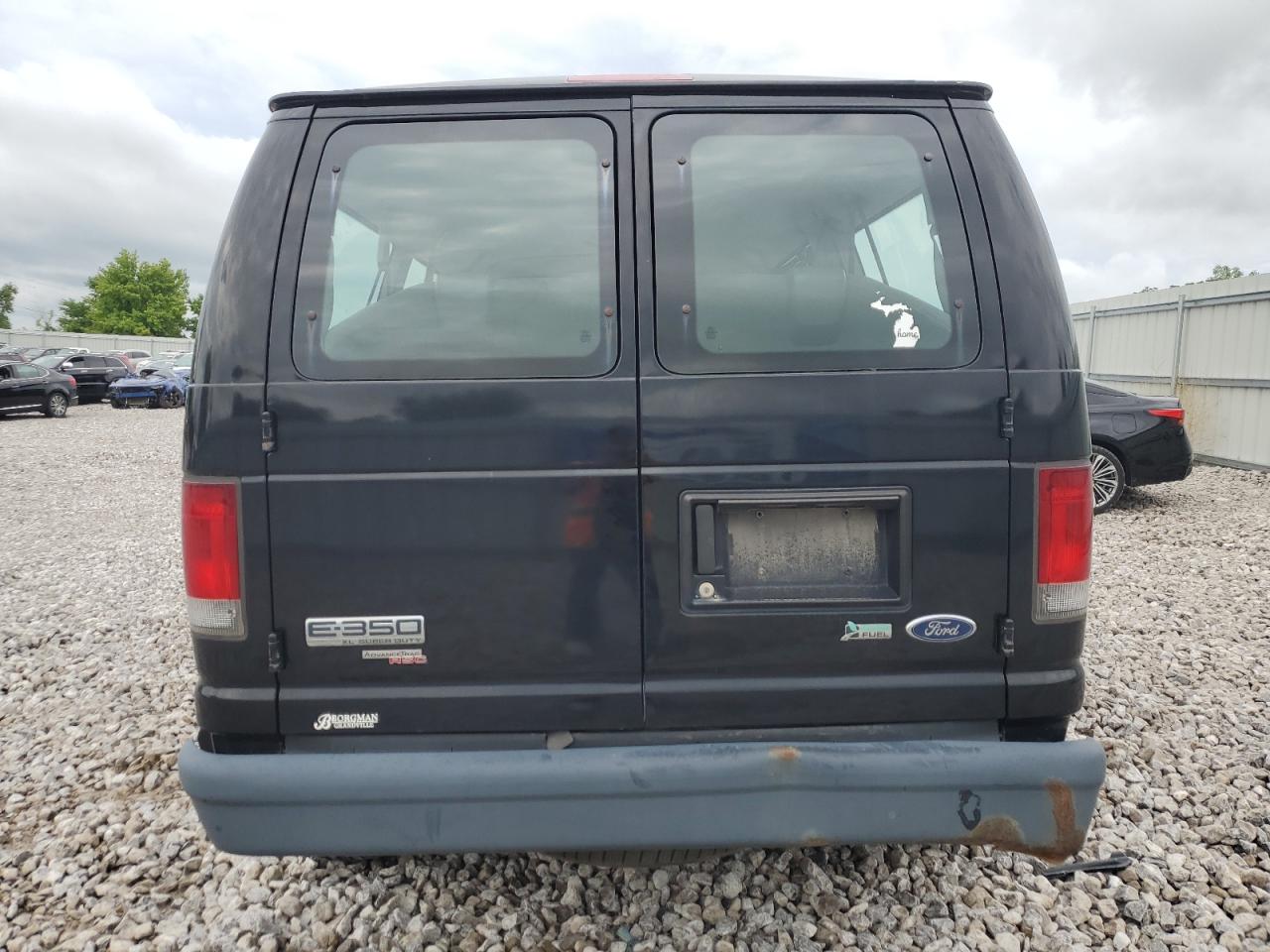 2011 Ford Econoline E350 Super Duty Wagon VIN: 1FBNE3BL6BDA01749 Lot: 65944014