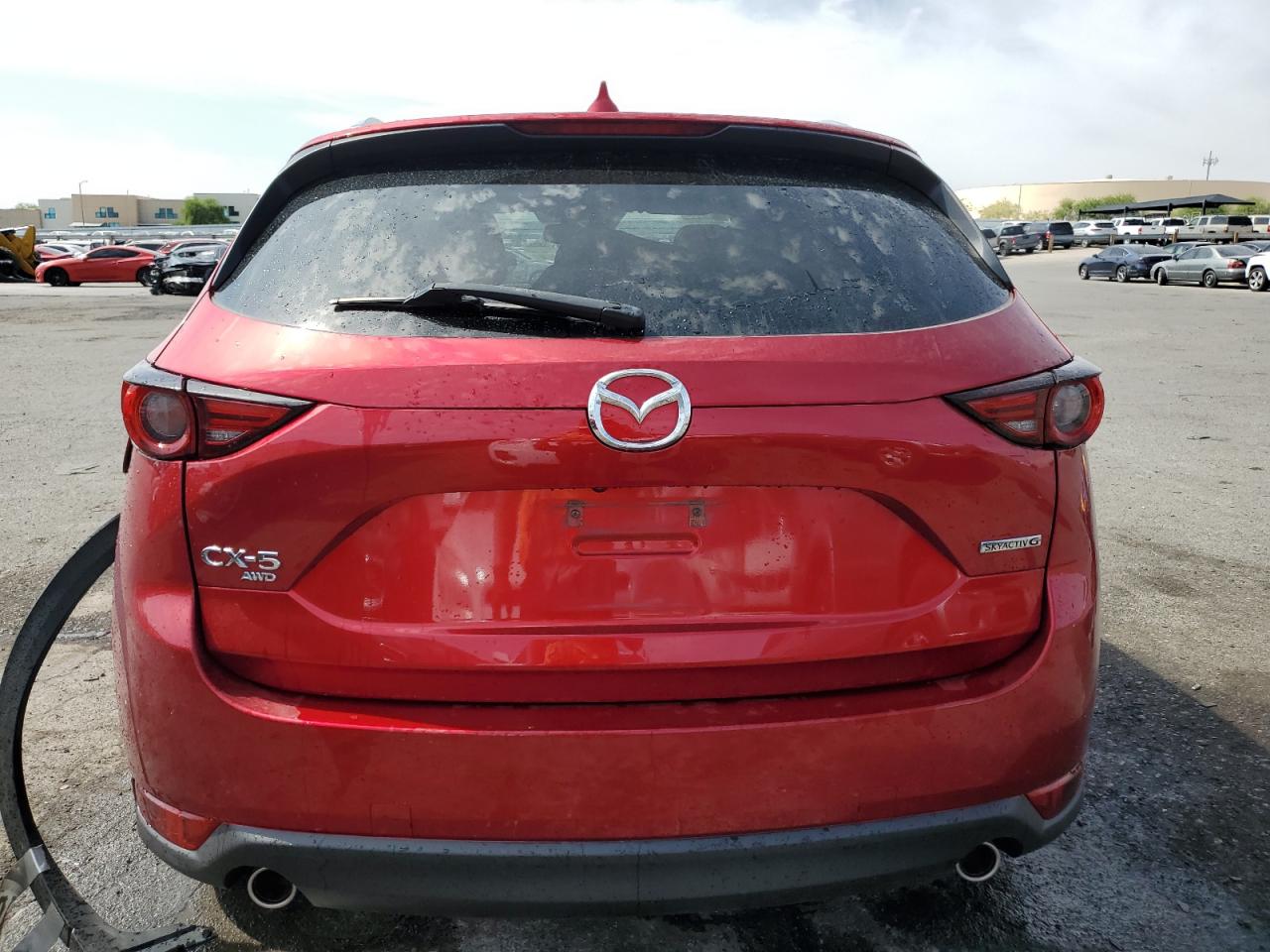 2021 Mazda Cx-5 Grand Touring VIN: JM3KFBDMXM1477140 Lot: 64811764