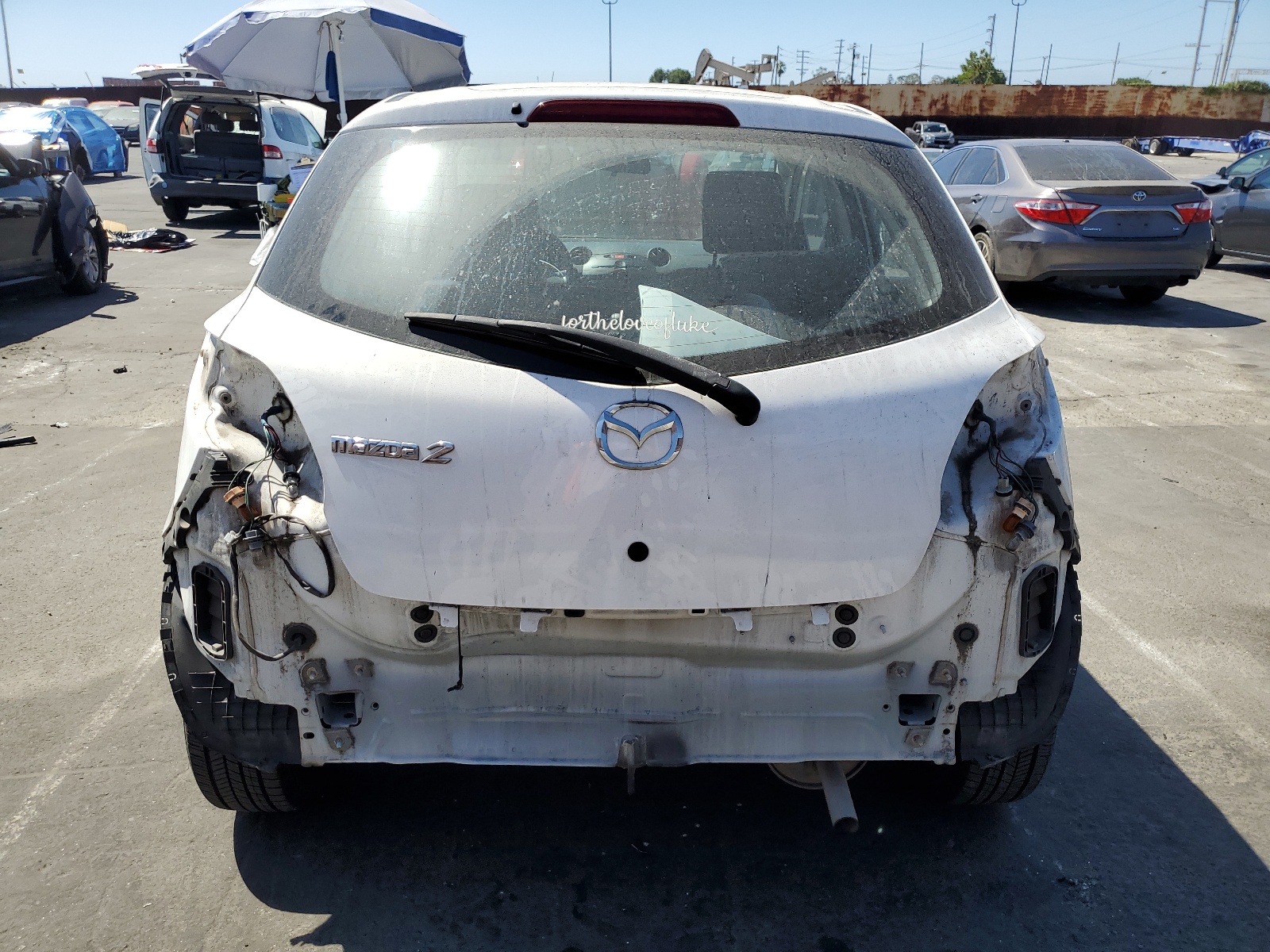 JM1DE1KY3C0138454 2012 Mazda Mazda2