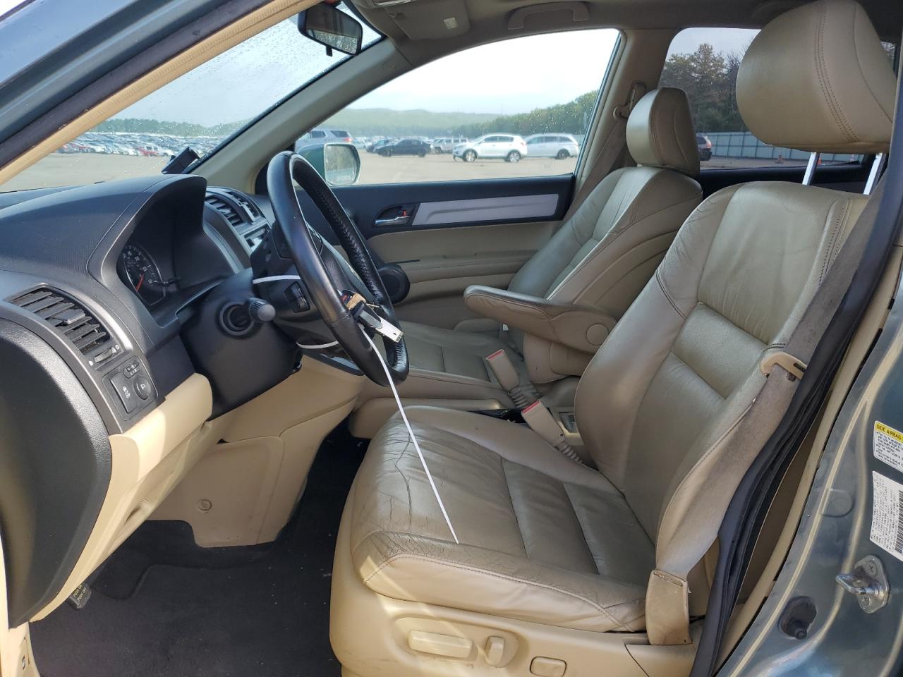 2010 Honda Cr-V Exl VIN: JHLRE4H70AC005736 Lot: 65993474