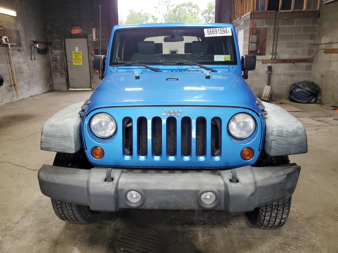 2010 Jeep Wrangler Sport VIN: 1J4AA2D17AL205163 Lot: 66691594