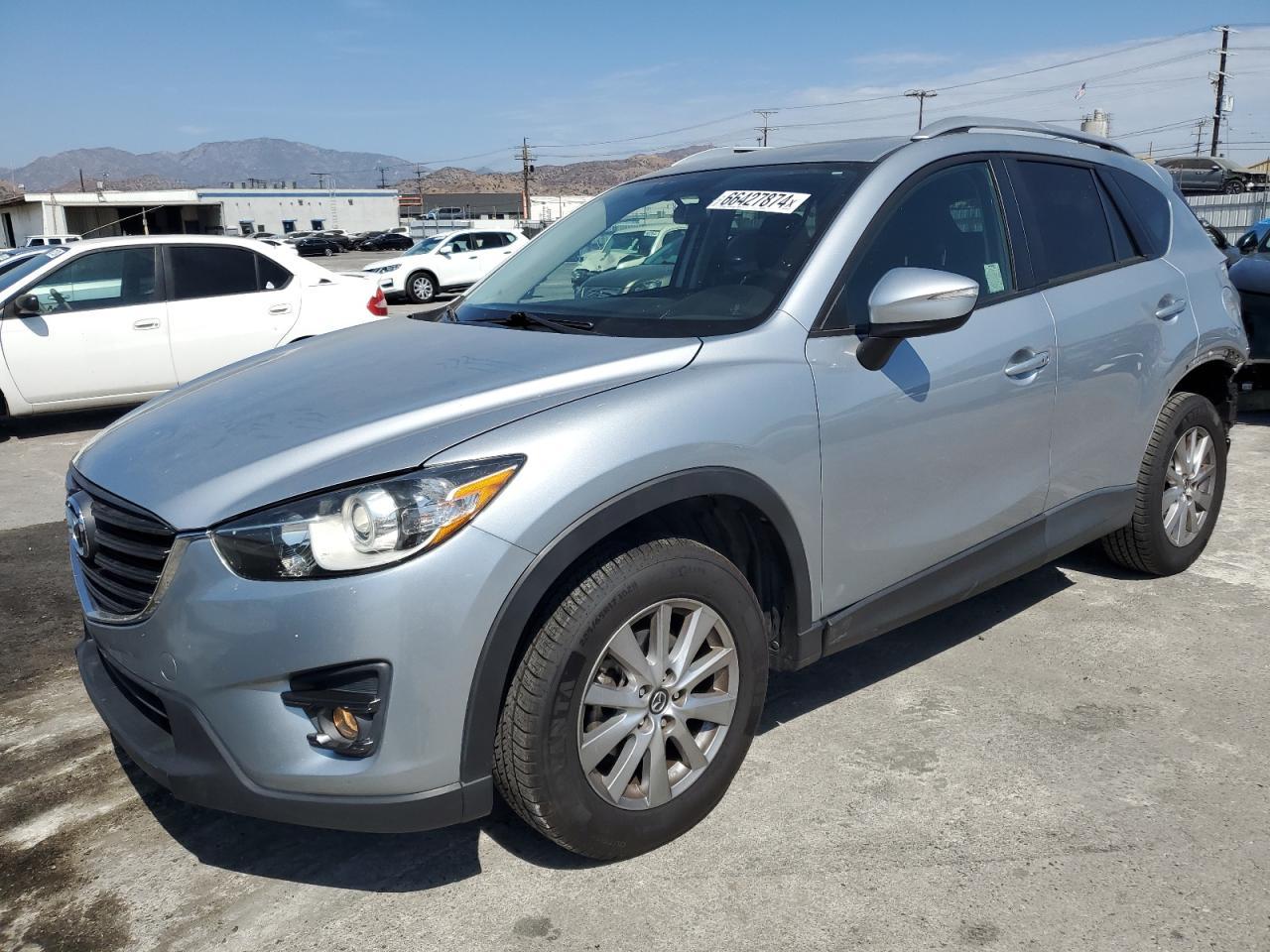 JM3KE2CY7G0787022 2016 MAZDA CX-5 - Image 1