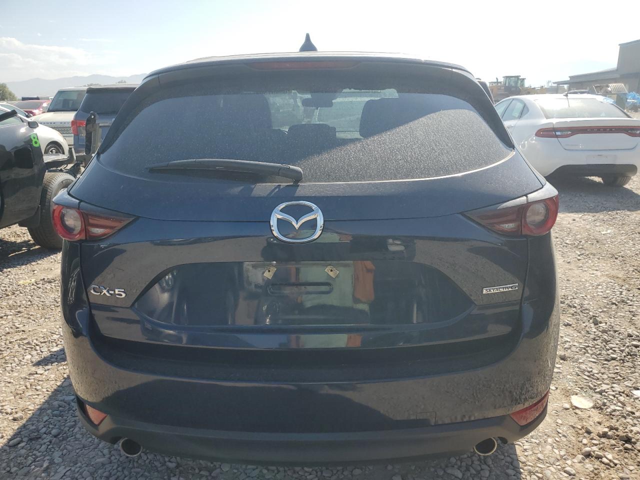 2021 Mazda Cx-5 Touring VIN: JM3KFACM1M0329671 Lot: 65957564