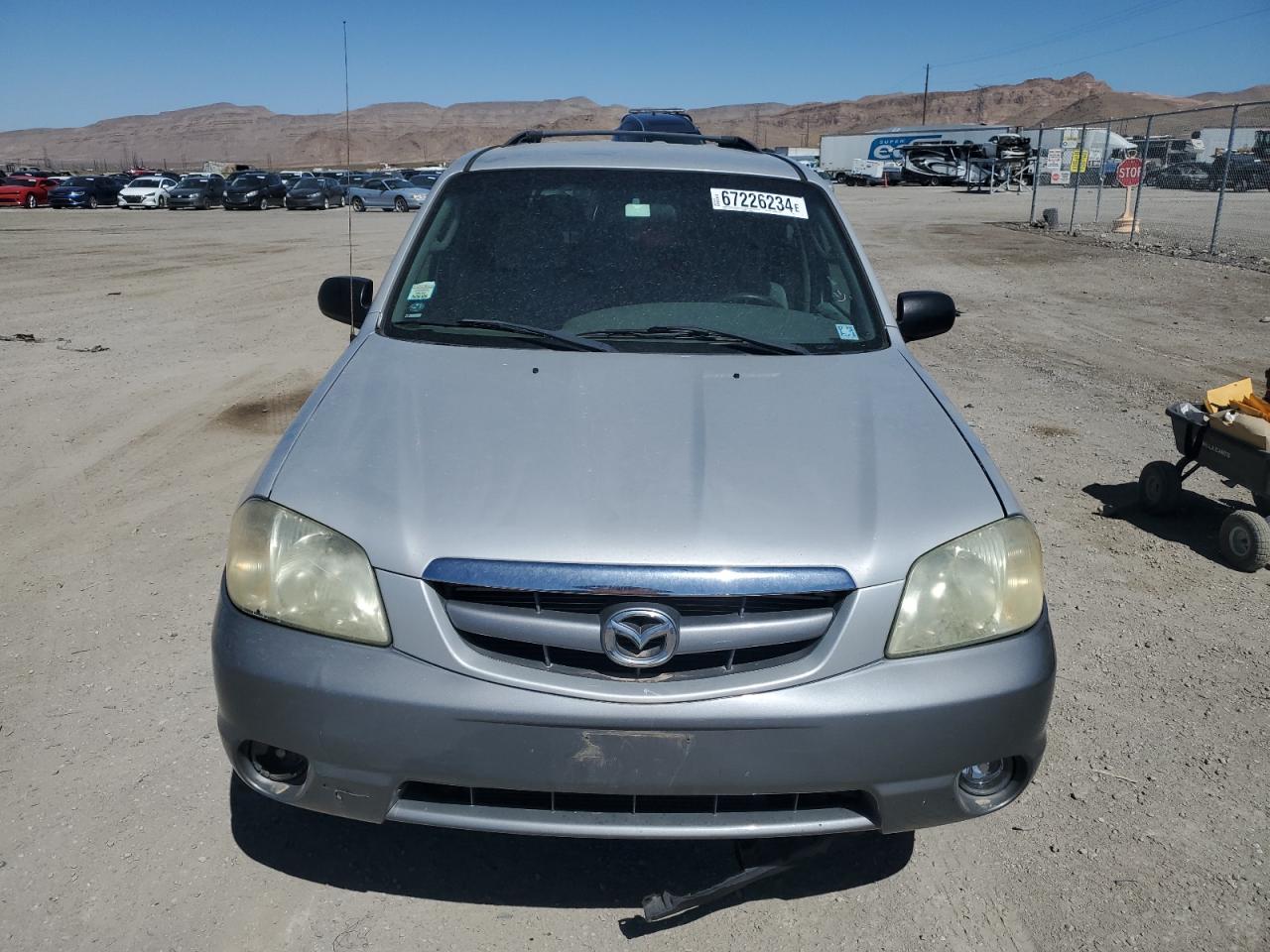 2002 Mazda Tribute Lx VIN: 4F2CU08122KM57513 Lot: 67226234