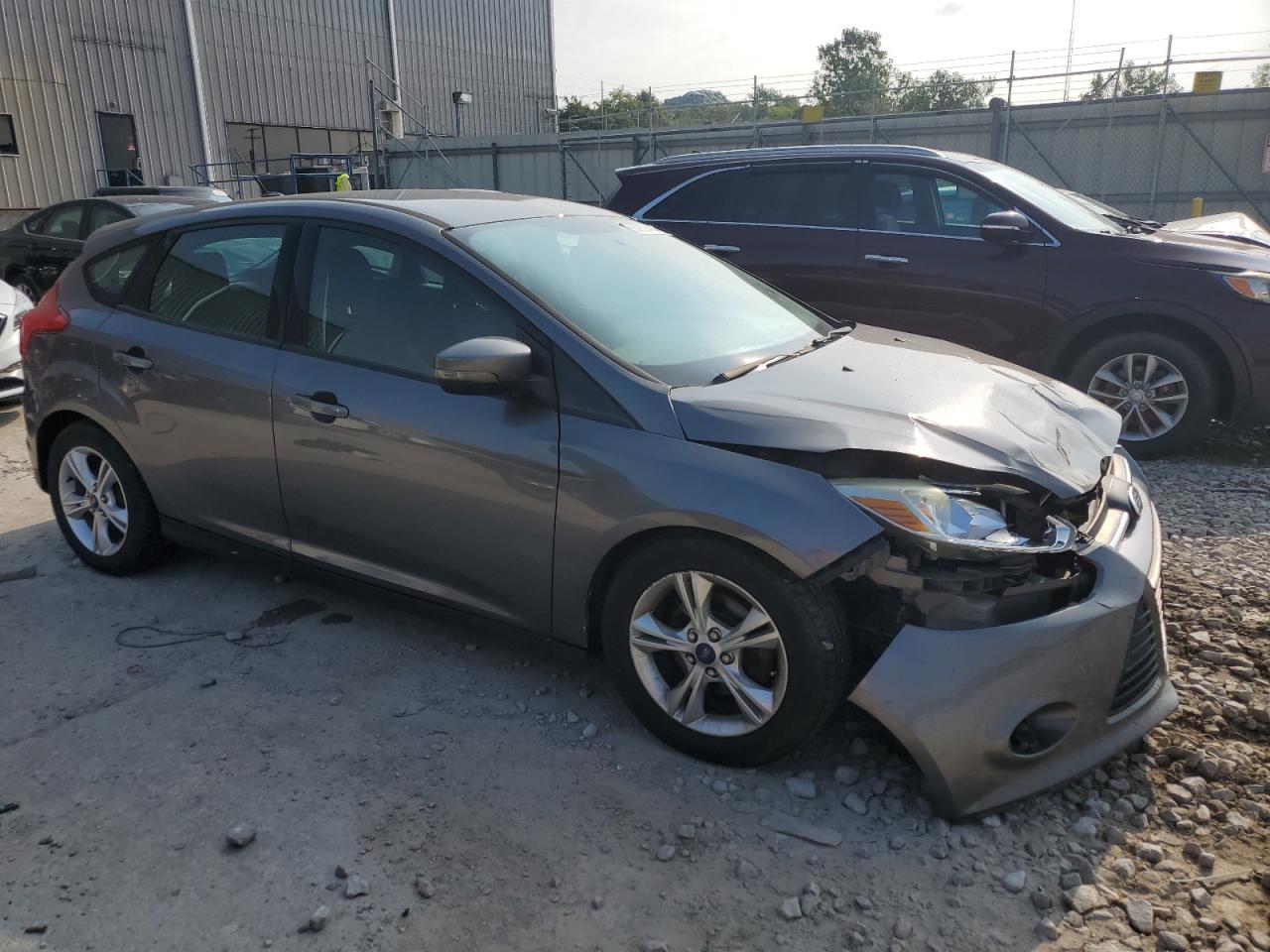 VIN 1FADP3K29EL314075 2014 FORD FOCUS no.4