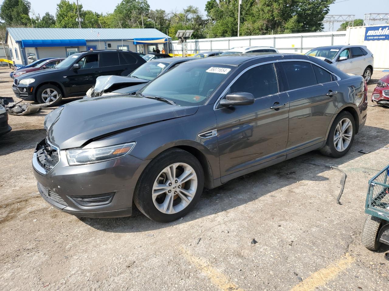 VIN 1FAHP2E80GG104407 2016 FORD TAURUS no.1