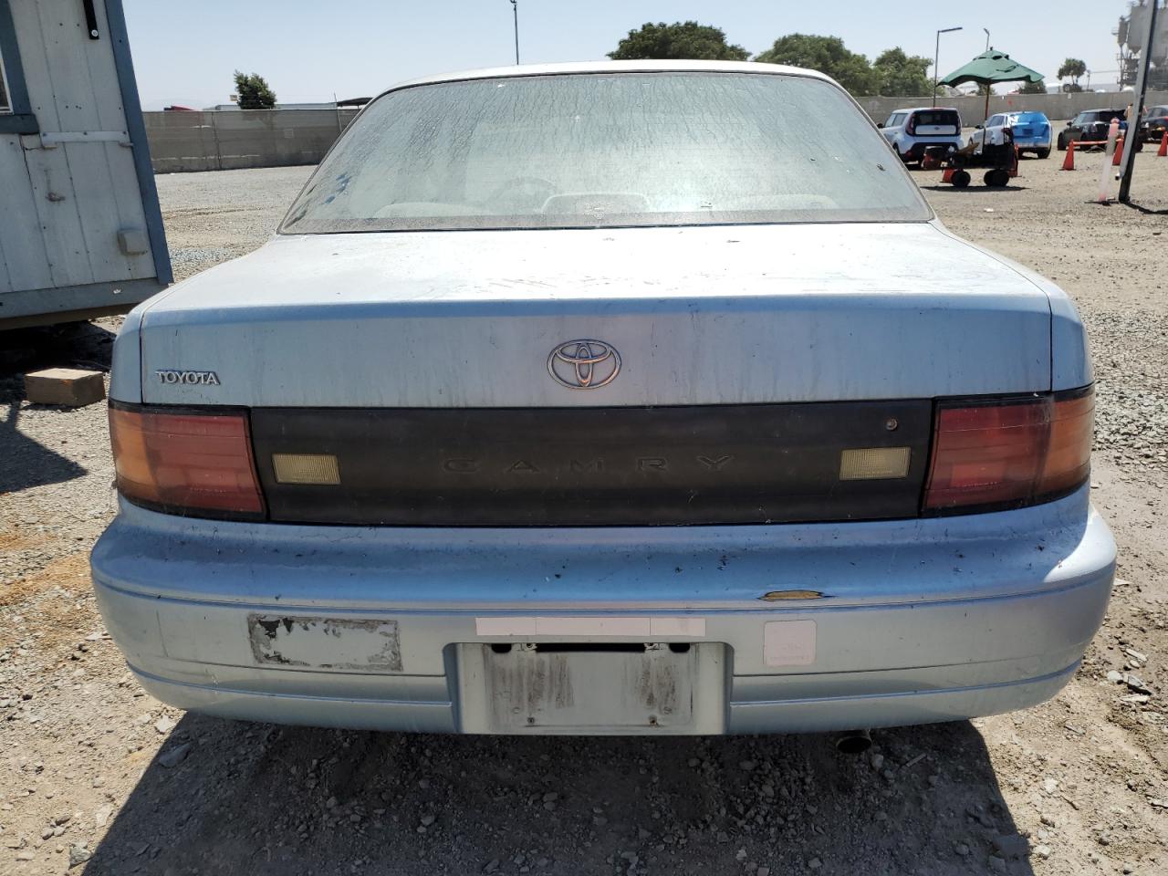 1993 Toyota Camry Dx VIN: 4T1SK11E4PU215205 Lot: 69653644