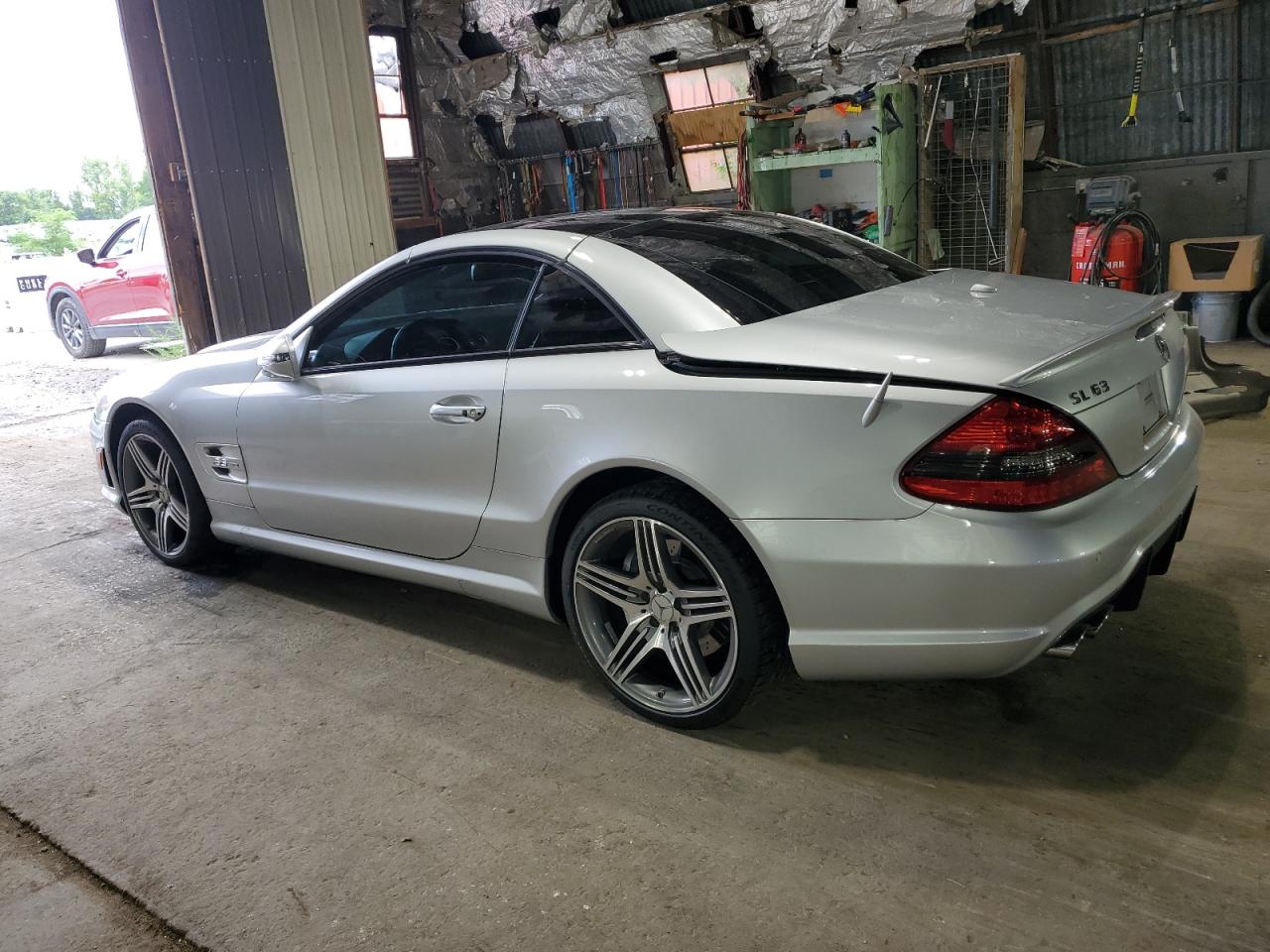 2009 Mercedes-Benz Sl 63 Amg VIN: WDBSK70F59F152574 Lot: 66140444
