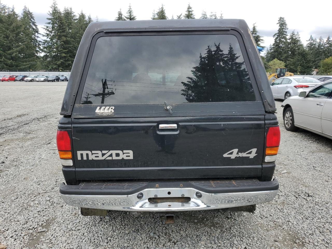 1999 Mazda B3000 Cab Plus VIN: 4F4ZR17V9XTM19601 Lot: 68272404